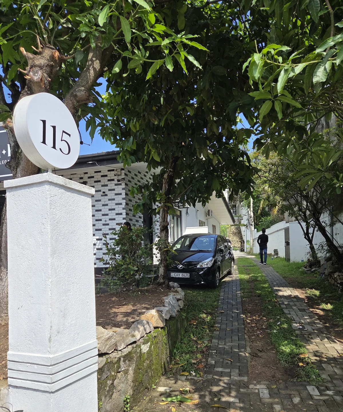 Villa 115 entrance sign